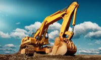 Large,Excavator,On,Construction,Site,On,A,Sunny,Day,With